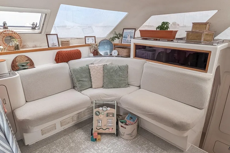 Slide: The Image of Cozy interior of a 2001 Voyage 440 yacht with comfortable seating and decorative accents. - 11