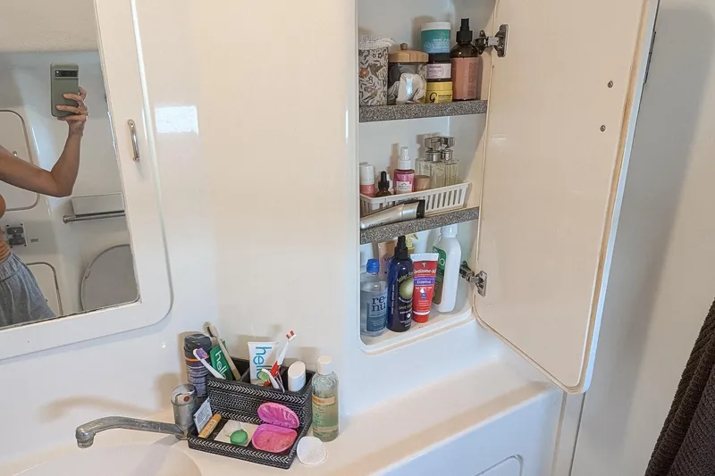 Slide: The Image of Bathroom cabinet with toiletries on a Voyage 440, 2001 model. - 24