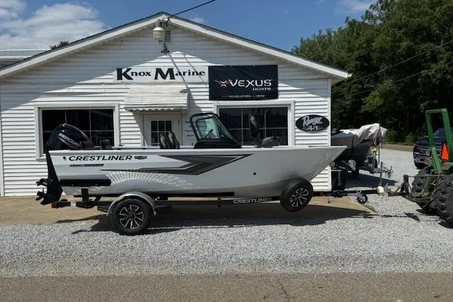 Slide: The Image of 2026 Crestliner 1650 Kodiak boat on trailer outside Knox Marine dealership. - 1