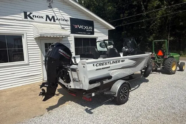 Slide: The Image of 2026 Crestliner 1650 Kodiak boat on trailer outside Knox Marine dealership. - 3