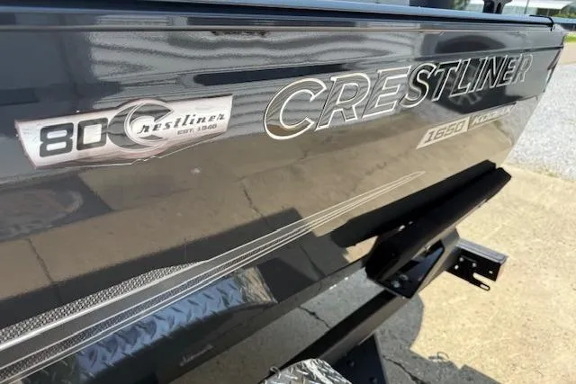Slide: The Image of 2026 Crestliner 1650 Kodiak boat exterior with logo and model details. - 8