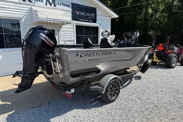 Slide: The Image of 2026 Crestliner 1650 Kodiak boat with Mercury engine, parked outside Knox Marine. - 3