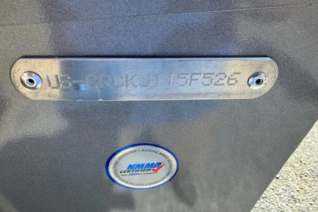 Slide: The Image of 2026 Crestliner 1650 Kodiak boat with visible serial number and NMMA certification label. - 4