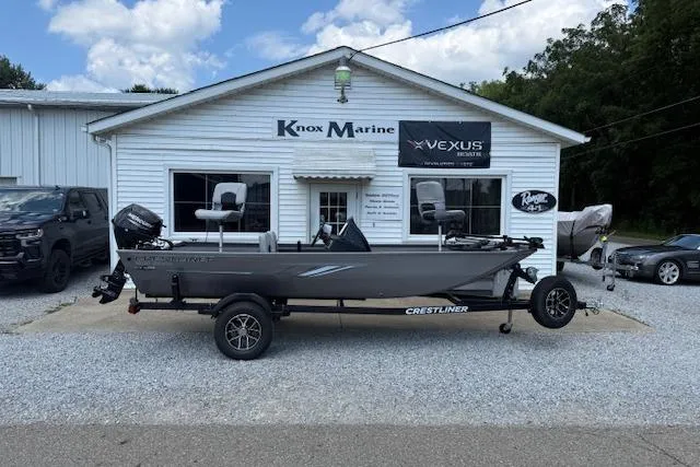The Image of 2026 Crestliner 1600 Storm boat on trailer outside Knox Marine dealership. - 1