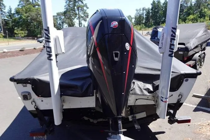 Slide: The Image of 2020 Lund 1875 Pro-V Sport boat with covered engine and Talon anchors. - 16