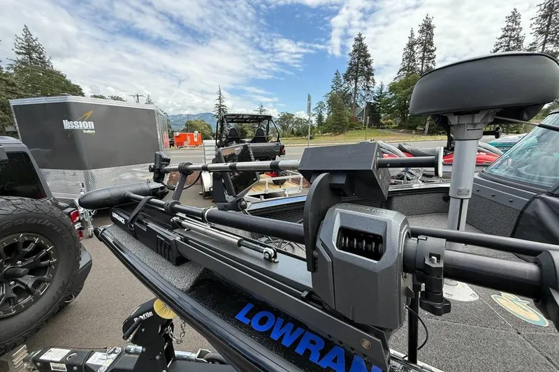Slide: The Image of 2020 Lund 1875 Pro-V Sport boat with Lowrance equipment, parked near Mission trailer. - 8