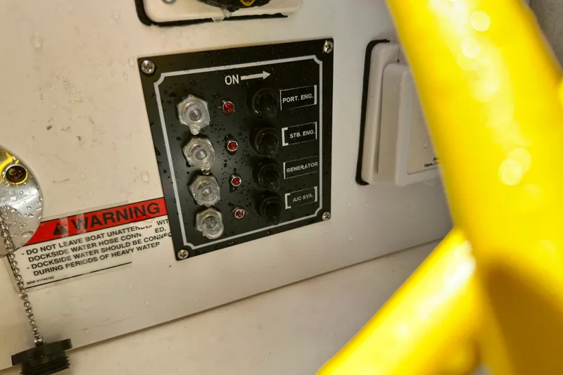 Slide: The Image of Control panel on a 2008 Sea Ray 340 Sundancer boat with warning label. - 109