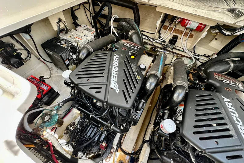 Slide: The Image of Engine room of 2008 Sea Ray 340 Sundancer with Mercury engines and various components. - 115