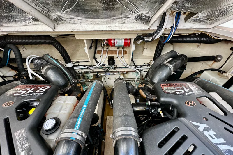 Slide: The Image of Engine compartment of a 2008 Sea Ray 340 Sundancer with MerCruiser 8.1S engines. - 118