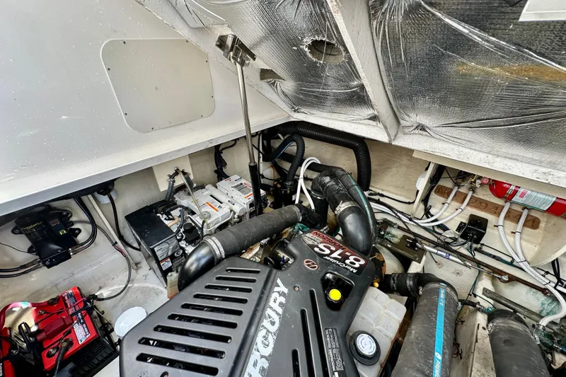 Slide: The Image of Engine room of 2008 Sea Ray 340 Sundancer with Mercury engine and wiring. - 119