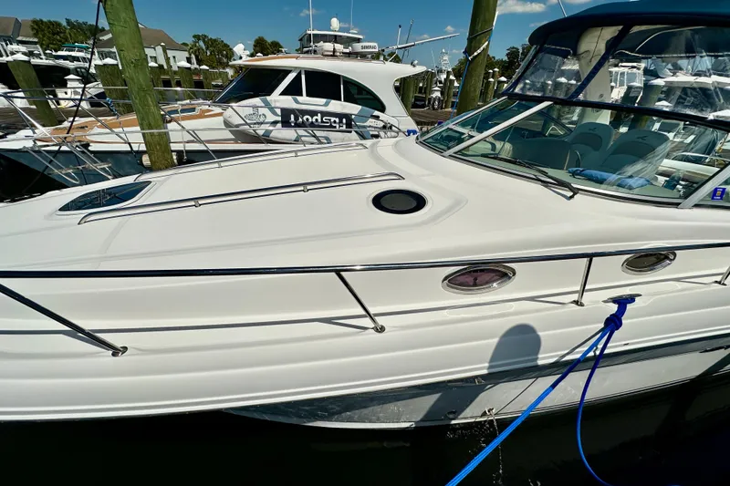Slide: The Image of 2008 Sea Ray 340 Sundancer yacht docked at marina, side view. - 12