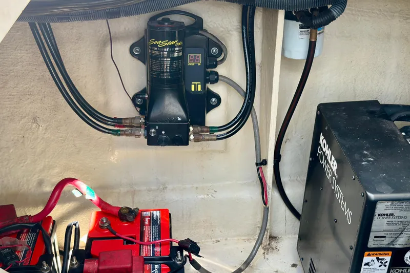 Slide: The Image of Engine compartment of 2008 Sea Ray 340 Sundancer with Kohler power system and wiring. - 120