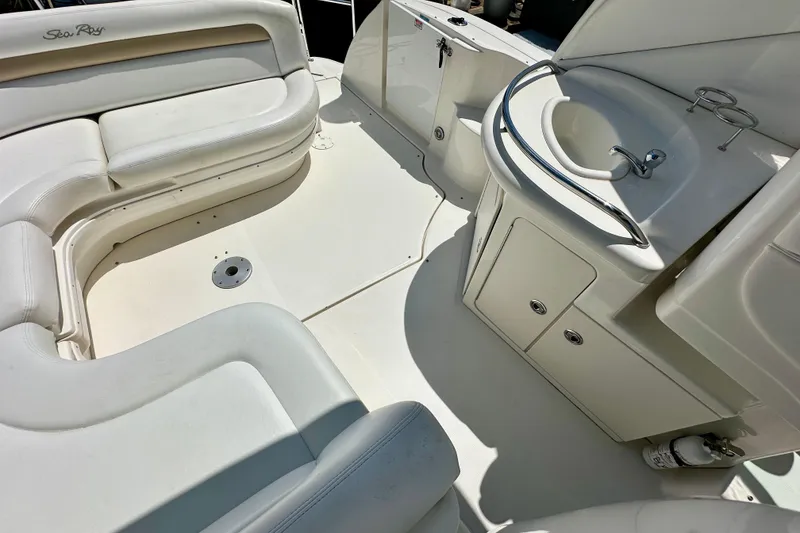 Slide: The Image of 2008 Sea Ray 340 Sundancer boat interior with seating and sink area. - 28