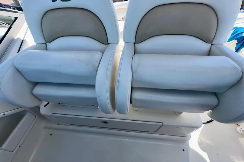 Slide: The Image of 2008 Sea Ray 340 Sundancer boat seats, white leather upholstery, dual seating arrangement. - 33