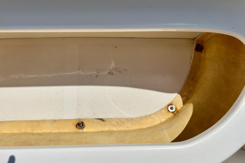 Slide: The Image of Close-up of 2008 Sea Ray 340 Sundancer boat interior detail with visible screws. - 44