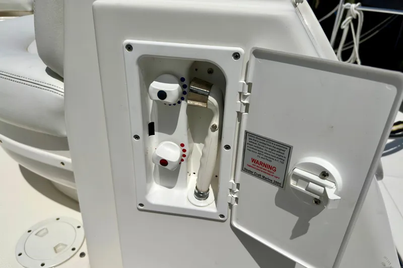 Slide: The Image of Control panel on a 2008 Sea Ray 340 Sundancer boat, featuring temperature dials. - 54