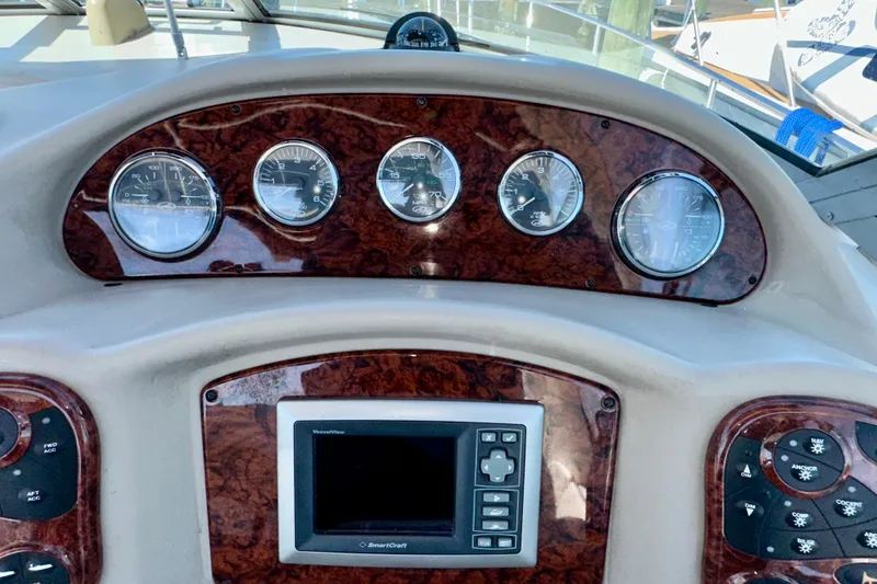 Slide: The Image of Dashboard of 2008 Sea Ray 340 Sundancer with gauges and navigation controls. - 66