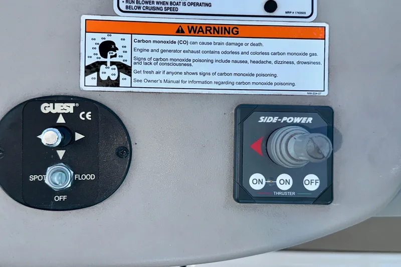 Slide: The Image of Control panel of a 2008 Sea Ray 340 Sundancer with carbon monoxide warning. - 67