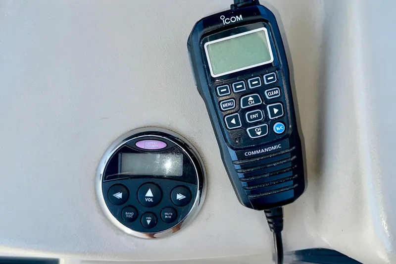 Slide: The Image of ICOM CommandMic and control panel on 2008 Sea Ray 340 Sundancer boat. - 68
