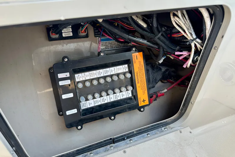 Slide: The Image of Electrical panel and wiring inside a 2008 Sea Ray 340 Sundancer boat. - 72