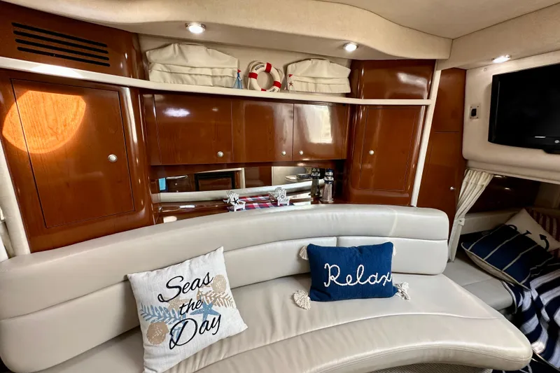 Slide: The Image of Luxurious interior of 2008 Sea Ray 340 Sundancer with cozy seating and nautical decor. - 78