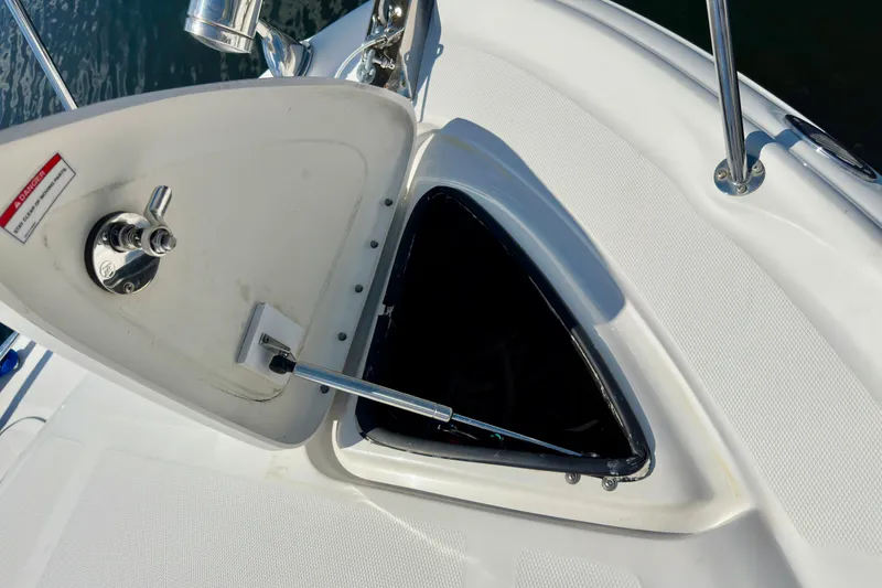 Slide: The Image of Open hatch on 2008 Sea Ray 340 Sundancer boat, showing storage compartment. - 8