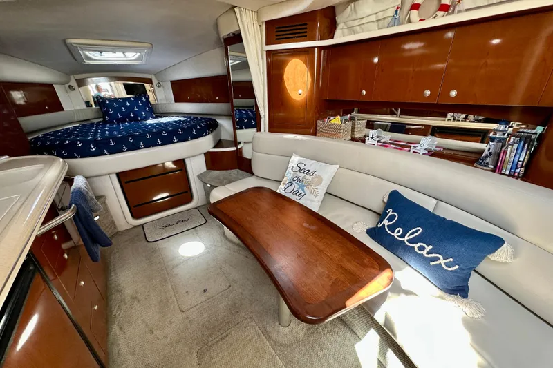 Slide: The Image of Luxurious interior of 2008 Sea Ray 340 Sundancer yacht with cozy seating and nautical decor. - 84