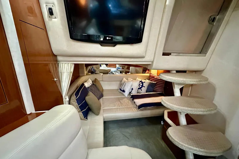 Slide: The Image of Luxurious interior of 2008 Sea Ray 340 Sundancer with cozy seating and modern amenities. - 92