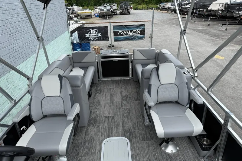 Slide: The Image of 2025 Avalon Venture Quad Lounger 2180 interior with gray seating and modern design. - 7