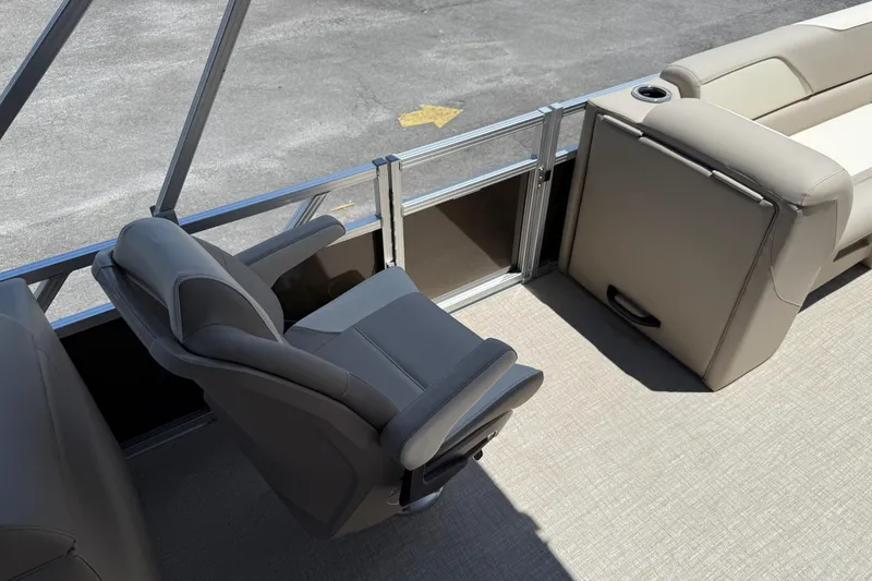 Slide: The Image of 2025 Avalon 2380 Venture Quad Lounger interior with comfortable seating and modern design. - 6