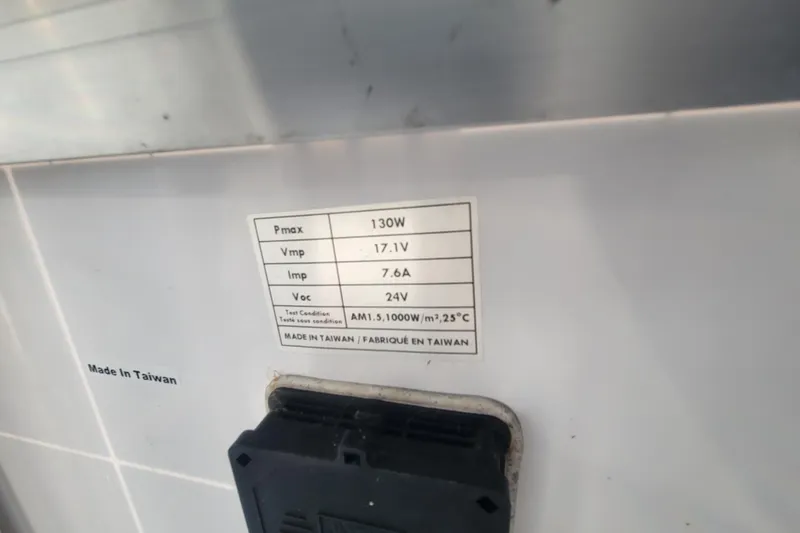 Slide: The Image of Label on a Hunter 38 (2009) solar panel, showing specifications and "Made in Taiwan." - 17