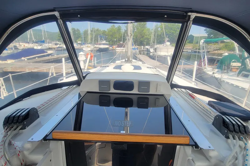 Slide: The Image of Cockpit view of 2009 Hunter 38 sailboat docked at marina. - 7