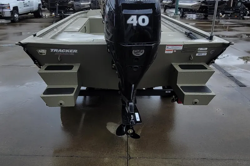 Slide: The Image of 2026 Tracker Grizzly 1654 T Sportsman boat with 40 HP motor, rear view. - 5