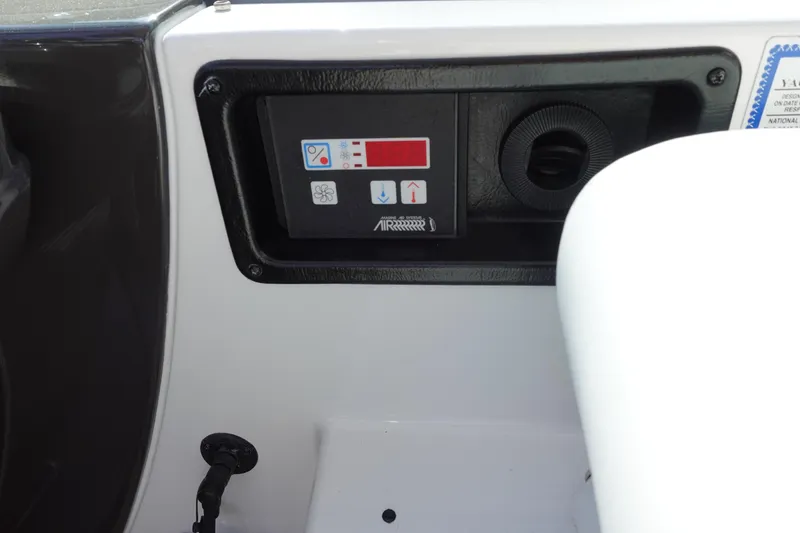 Slide: The Image of Control panel on a 2016 Monterey 355 Sport Yacht dashboard. - 14