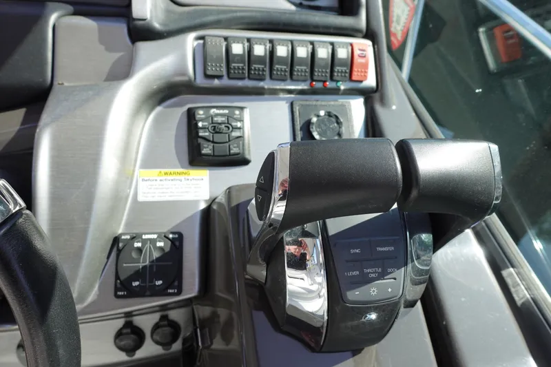 Slide: The Image of Control panel of 2016 Monterey 355 Sport Yacht with throttle and switches. - 15
