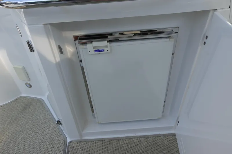 Slide: The Image of 2016 Monterey 355 Sport Yacht interior with built-in refrigerator. - 17