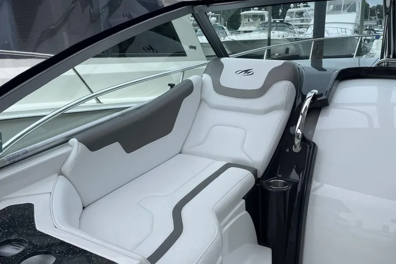 Slide: The Image of 2016 Monterey 355 Sport Yacht interior with luxurious white seating and sleek design. - 20