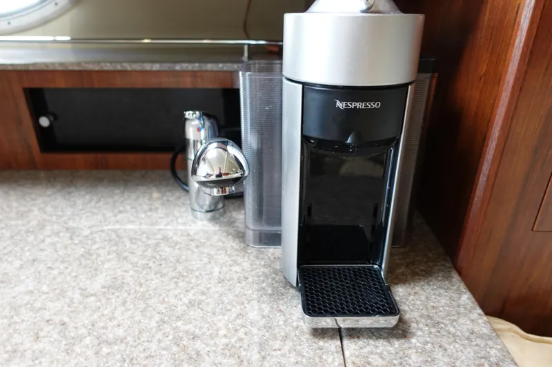 Slide: The Image of Nespresso machine on countertop in 2016 Monterey 355 Sport Yacht kitchen. - 26
