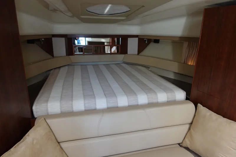 Slide: The Image of Interior of 2016 Monterey 355 Sport Yacht with bed and seating area. - 27