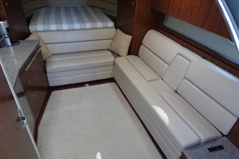 Slide: The Image of Luxurious interior of 2016 Monterey 355 Sport Yacht with beige leather seating and modern design. - 28