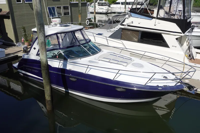 Slide: The Image of 2016 Monterey 355 Sport Yacht docked at marina, featuring sleek design and modern amenities. - 3