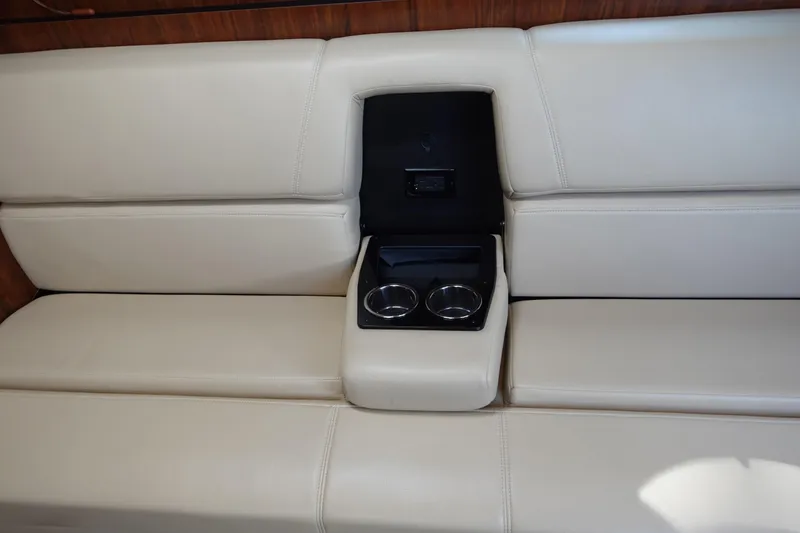 Slide: The Image of Beige leather seating with cup holders in 2016 Monterey 355 Sport Yacht. - 32