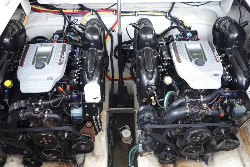 Slide: The Image of Engine compartment of a 2016 Monterey 355 Sport Yacht, featuring dual inboard motors. - 40