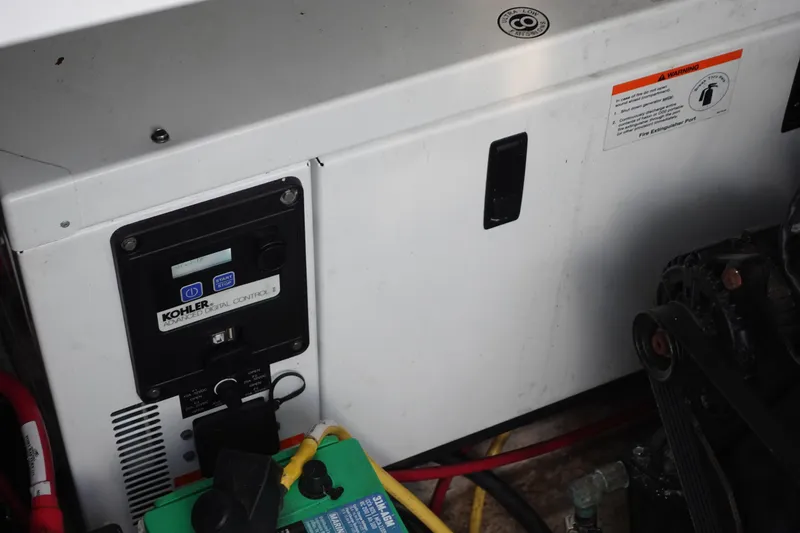 Slide: The Image of Engine compartment of 2016 Monterey 355 Sport Yacht with Kohler digital control panel. - 41