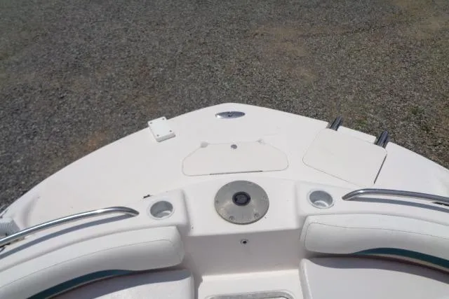 Slide: The Image of Bow of a 2005 Hurricane GS211 boat with seating and cup holders. - 14