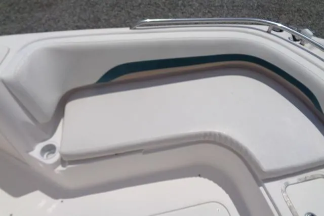 Slide: The Image of 2005 Hurricane GS211 boat interior with white seating and sleek design. - 20