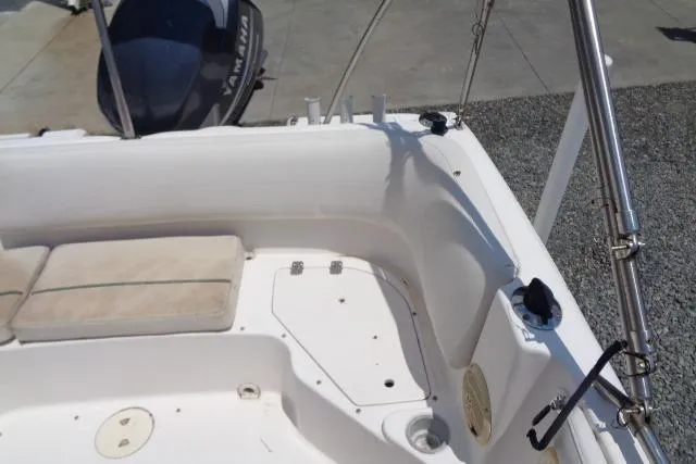 Slide: The Image of 2005 Hurricane GS211 boat interior with seating and Yamaha engine. - 35