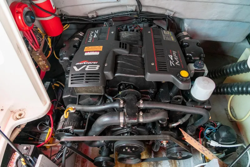 Slide: The Image of 1999 Chaparral 252 Sunesta boat engine compartment with MerCruiser V8 engine. - 22