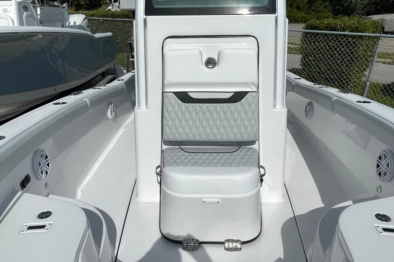 Slide: The Image of 2026 Blackfin 242HB boat interior with cushioned seating and modern design. - 10