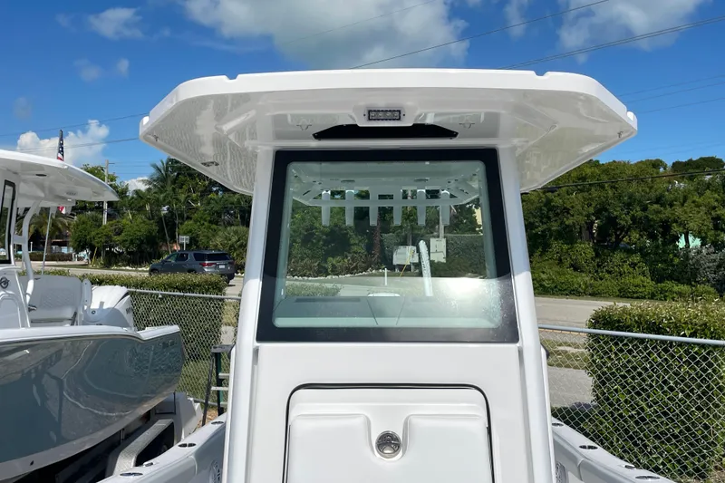 Slide: The Image of 2026 Blackfin 242HB boat, front view, showcasing sleek design and modern features. - 11
